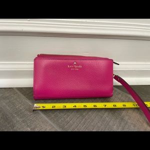 Kate Spade pink wristlet, like new only used 2 times
